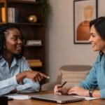 an African American female student confidently discussing her academic plan with a supportive, university advisor.